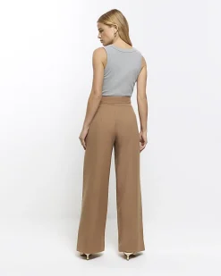 Beige asymmetric waist wide leg trousers