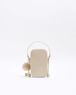 Beige quilted pom pom cross body bag