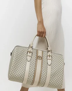 Beige RI monogram travel bag