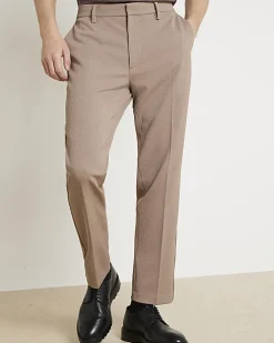 Beige slim fit waffle textured trousers