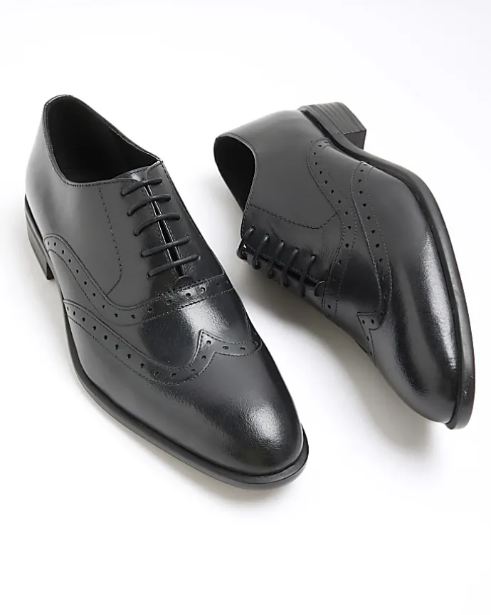 Black brogue derby shoes