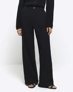 Black elasticated wide leg trousers