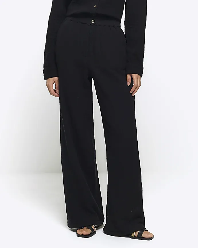 Black elasticated wide leg trousers