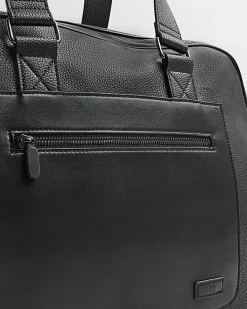 Black faux leather holdall