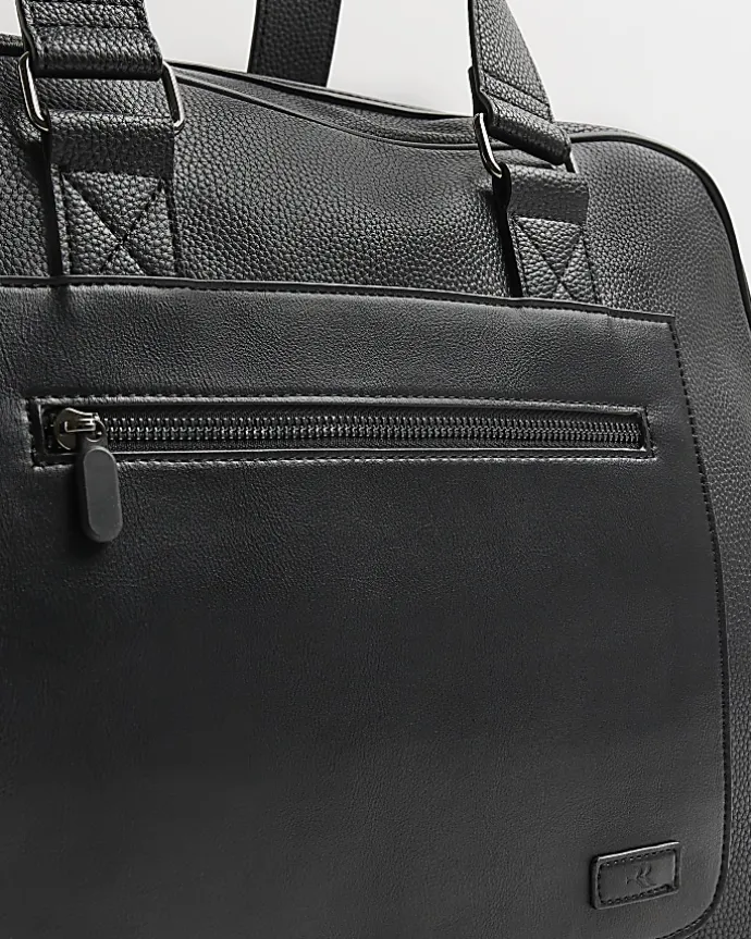 Black faux leather holdall