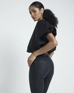 Black mid rise skinny coated jeans