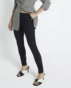 Black mid rise skinny trousers