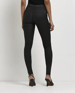 Black Molly coated mid rise skinny jeans