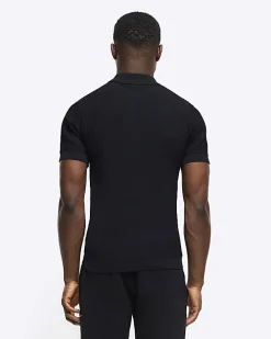 Black muscle fit knitted half zip polo