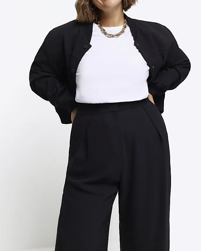 Black pleated wide leg trousers
