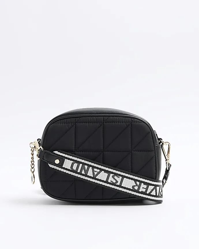 Black quilted camera cross body bag