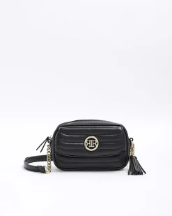 Black quilted front pocket cross body bag