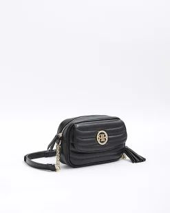 Black quilted front pocket cross body bag