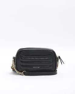 Black quilted front pocket cross body bag