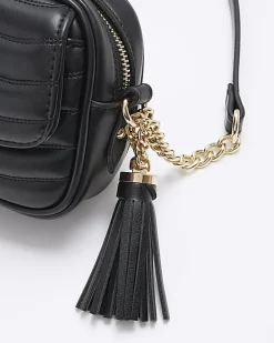 Black quilted front pocket cross body bag