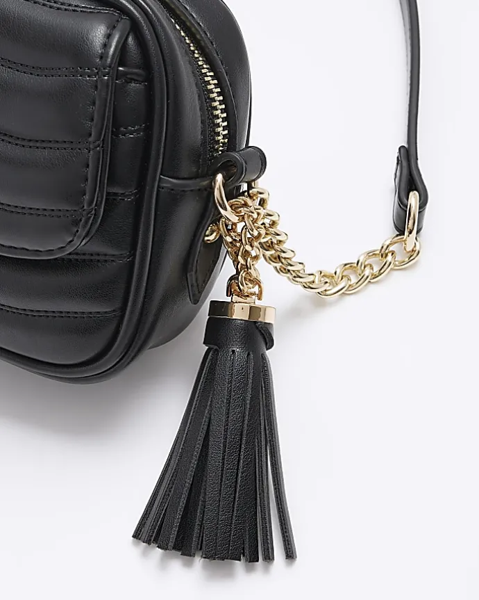 Black quilted front pocket cross body bag