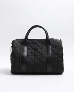 Black quilted travel bag