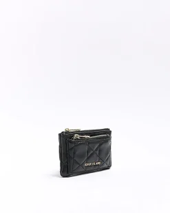 Black quilted zip pouch