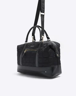 Black quilted zip travel bag
