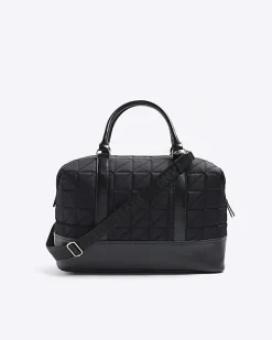 Black quilted zip travel bag