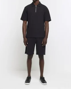 Black regular fit textured half zip polo