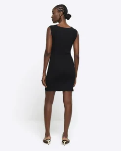 Black rib peplum hem bodycon mini dress