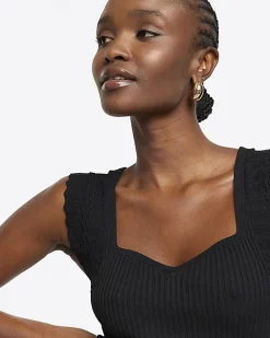 Black rib peplum hem bodycon mini dress