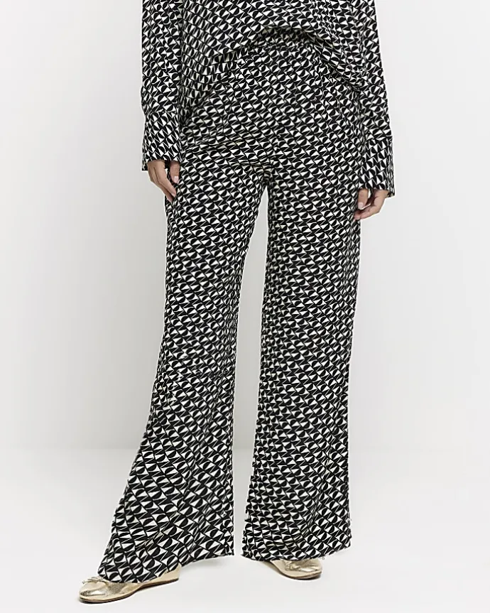 Black satin geometric wide leg trousers