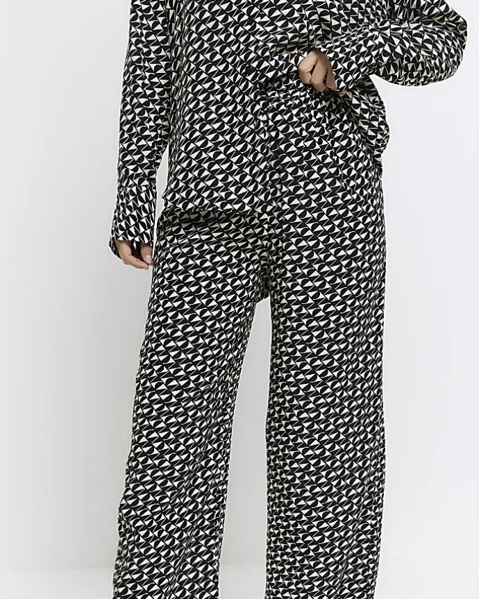 Black satin geometric wide leg trousers