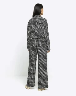 Black satin geometric wide leg trousers