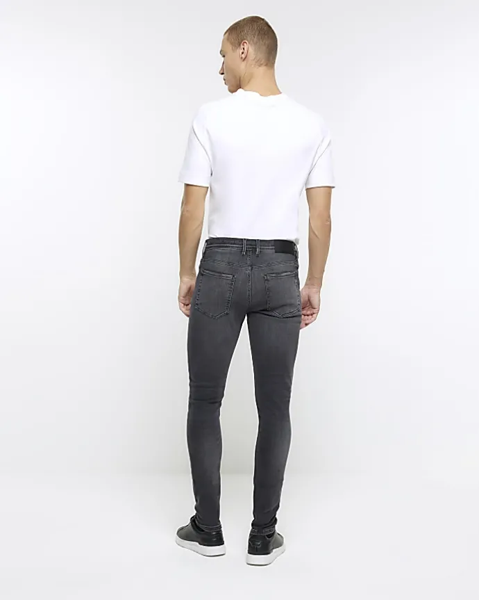 Black spray on super skinny fit ripped jeans