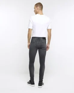 Black spray on super skinny fit ripped jeans