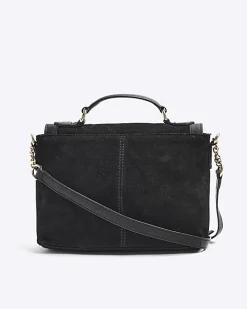 Black suede studded satchel bag