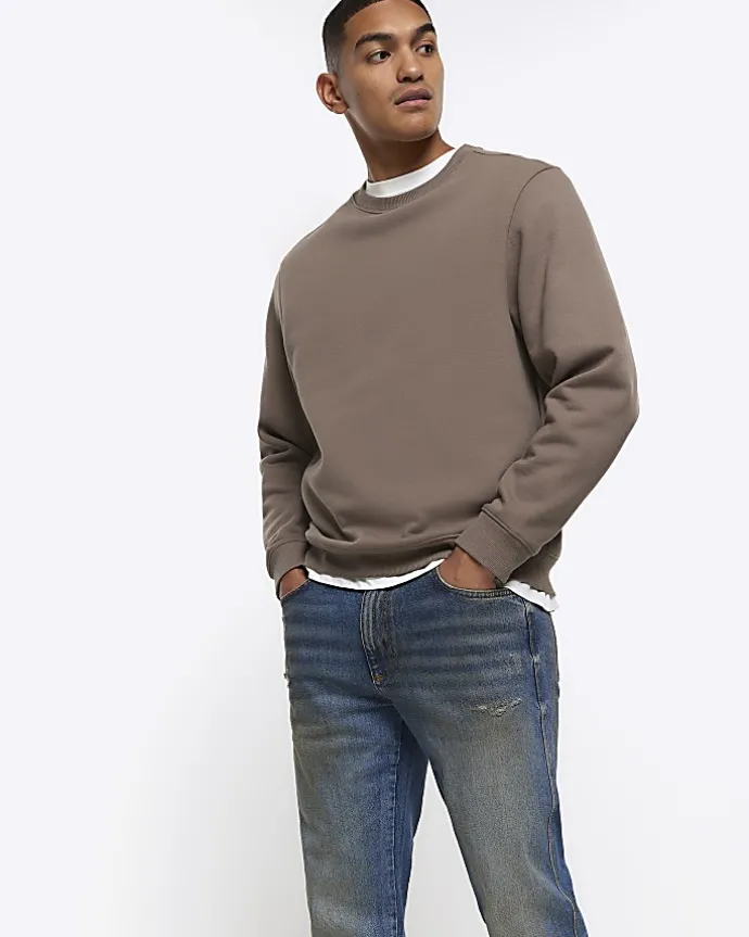 Blue faded tapered fit jeans