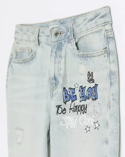 Blue graffiti ripped jeans