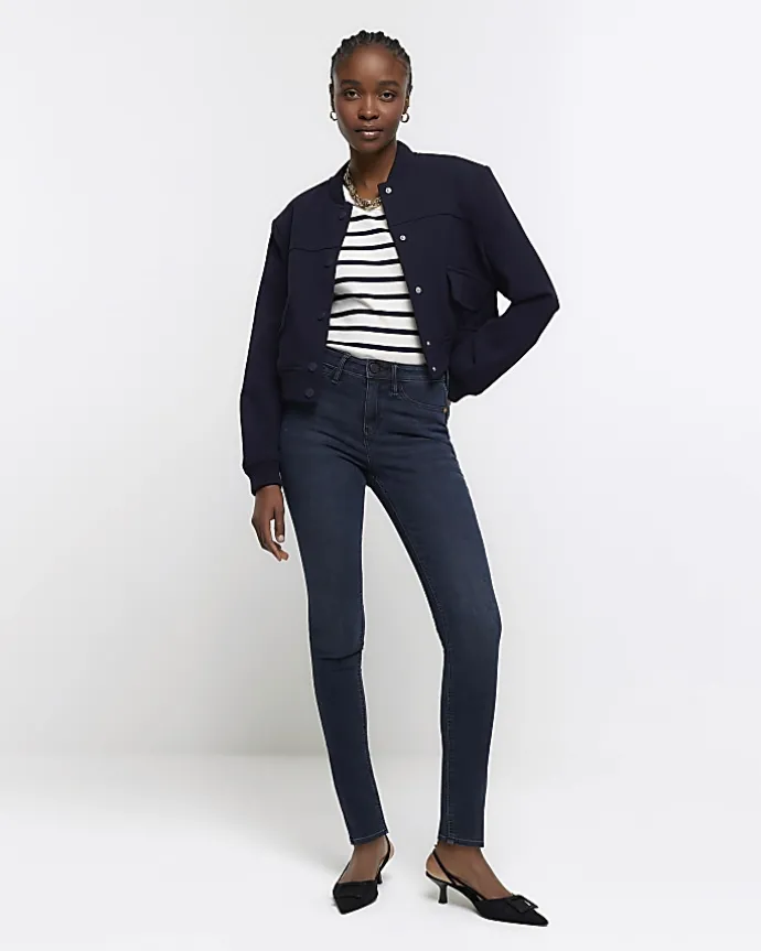 Blue mid rise bum sculpt skinny jeans