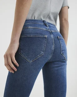 Blue mid rise bum sculpt skinny jeans