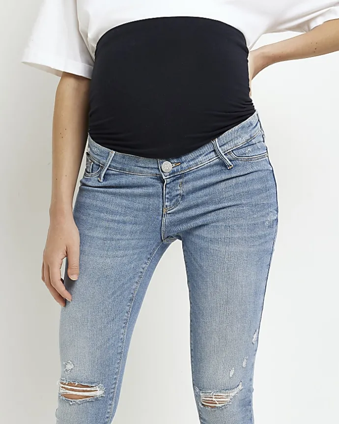 Blue mid rise maternity ripped skinny jeans