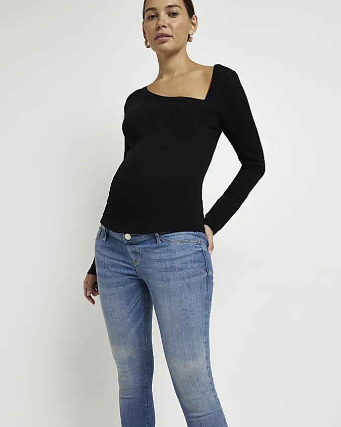 Blue mid rise maternity skinny jeans
