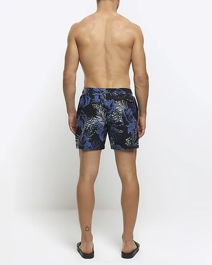 Blue regular fit botanical print shorts