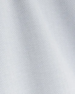 Blue slim fit herringbone zip polo shirt