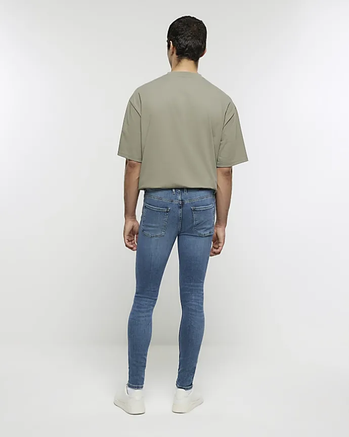 Blue super skinny spray on washed jeans