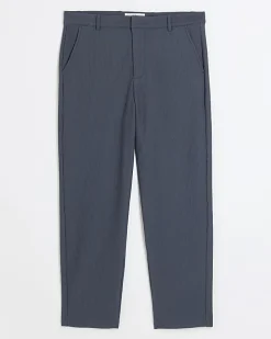 Blue tapered fit plisse smart trousers