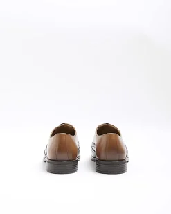Brown brogue derby shoes