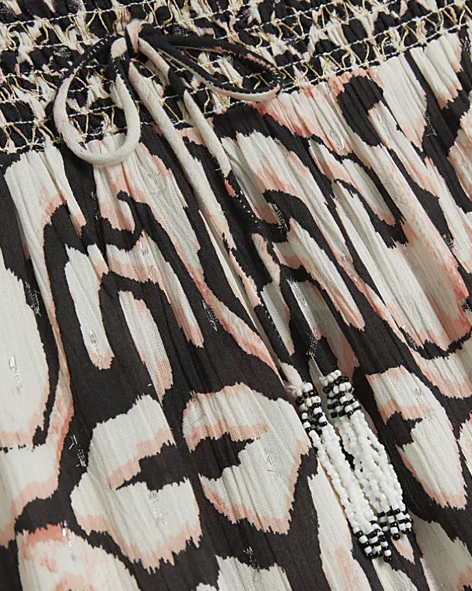 Cream abstract wide leg beach trousers