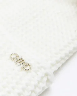 Cream double pom pom beanie