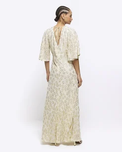 Cream glitter star maxi dress