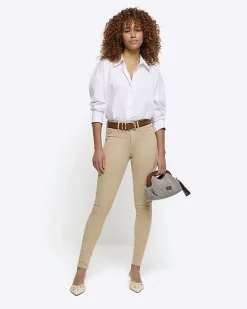 Cream mid rise bum sculpt jeggings