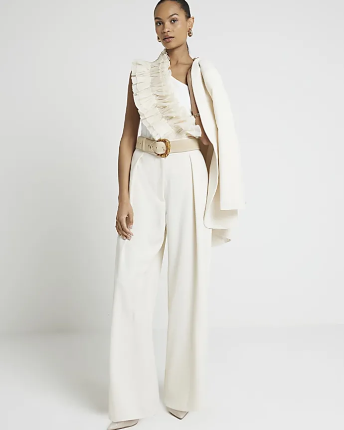 Cream pleated wide leg trousers