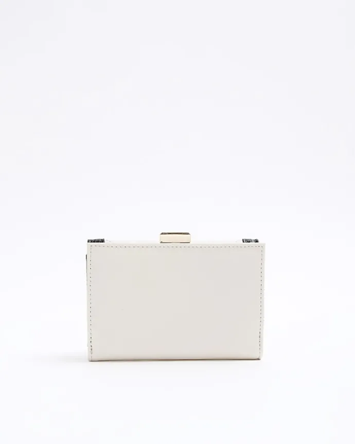 Cream quilted clip top purse